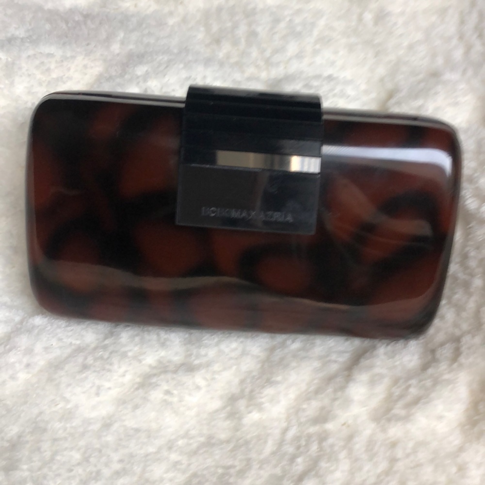 Mini clutch. Hard sided.